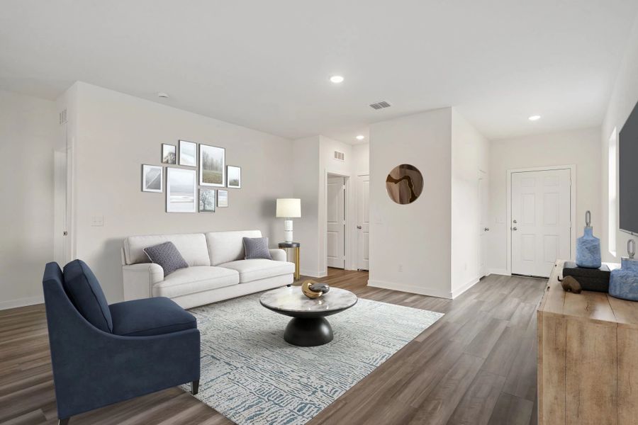 Representative furnished interior of a home built from the Odyssey by Starlight Homes in Oakfield Lakes, Parrish (Image 5).