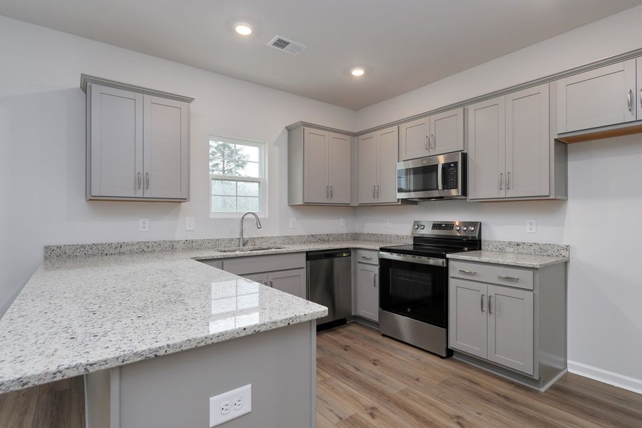 Furnished interior view inside a new home in Hainer Place, Conway (Image 11).