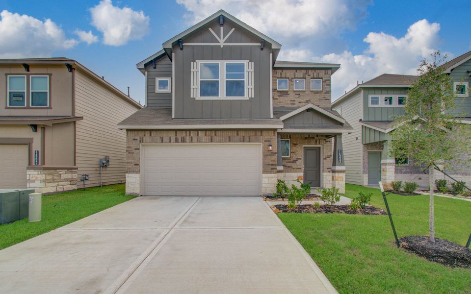 Front exterior of a new home in Aldine Pines, Houston, TX, highlighting curb appeal (Image 26).