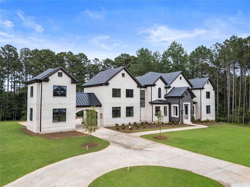 Front exterior of a new home in , Milton, GA, highlighting curb appeal (Image 25).