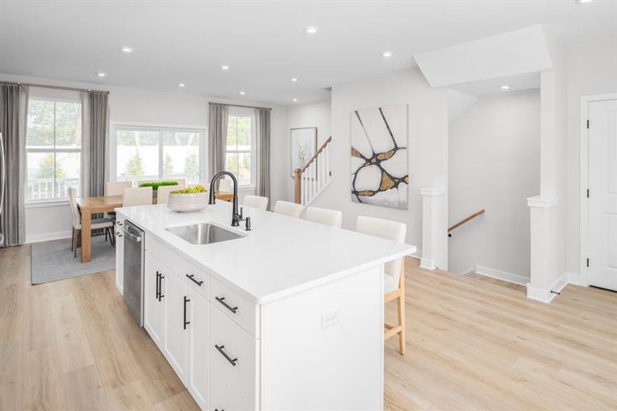 Representative furnished interior of a home built from the Sonata by Ryan Homes in Townes at The Station, Apex (Image 7). Representative furnished interior of a home built from the Sonata by Ryan Homes in Townes at The Station, Apex (Image 7).