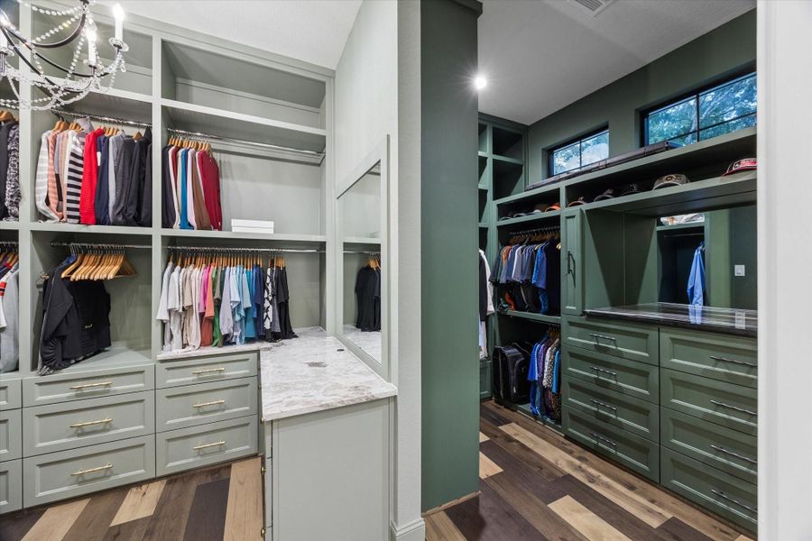 A second view highlights the remarkable scale and functionality of the primary dressing room. Every custom-built cabinet, drawer, and display was thoughtfully designed to maximize organization while maintaining refined elegance.