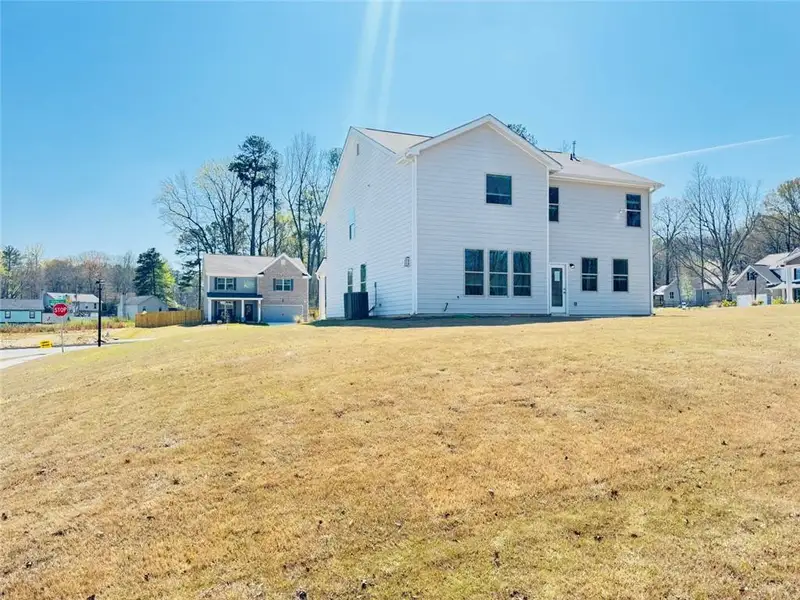 Exterior details and patio area of a home in Paces Estates, Lithia Springs (Image 3).