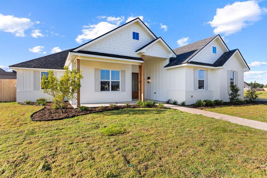 Front exterior of a new home in , Robinson, TX, highlighting curb appeal (Image 24). Front exterior of a new home in , Robinson, TX, highlighting curb appeal (Image 24).