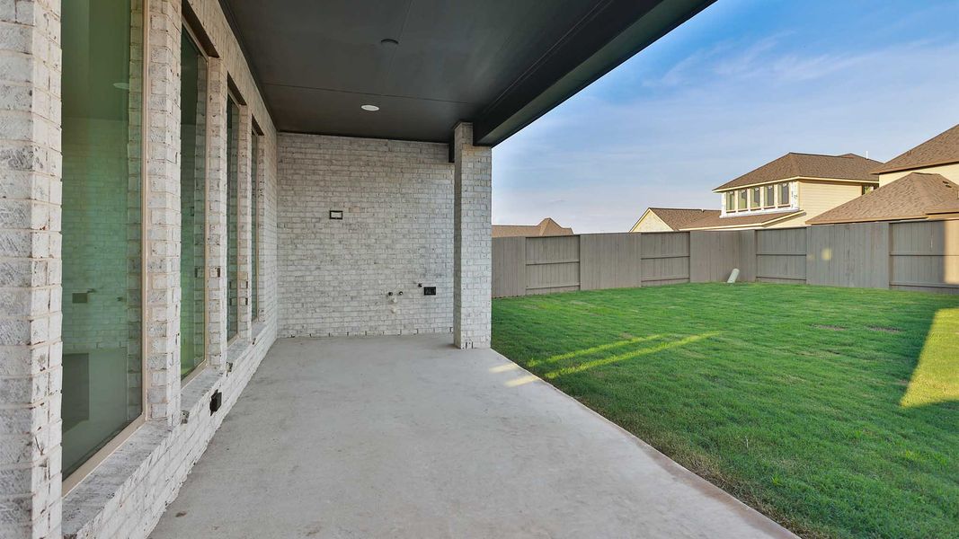 Exterior details and patio area of a home in Revera, Richmond (Image 3).