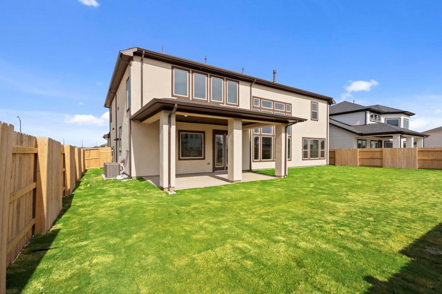 Exterior details and patio area of a home in Elyson 45' & 70', Katy (Image 3).