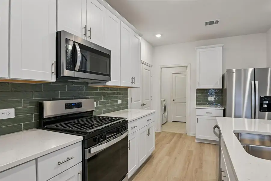 Photo is not of the actual home, but is an inspirational photo of builder’s model home and may depict options, furnishings, and/or decorator features that are not included.