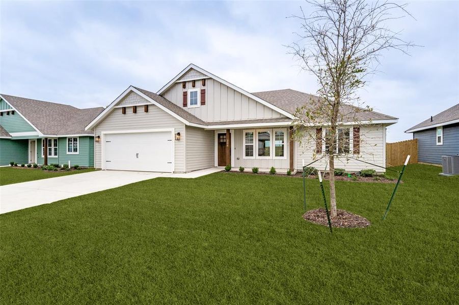 Front exterior of a new home in , Whitesboro, TX, highlighting curb appeal (Image 2). Front exterior of a new home in , Whitesboro, TX, highlighting curb appeal (Image 2).