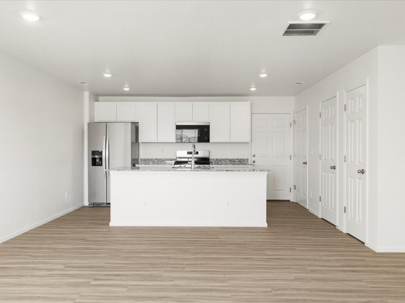 Furnished interior view inside a new home in Skyview at High Point, Aurora (Image 3).
