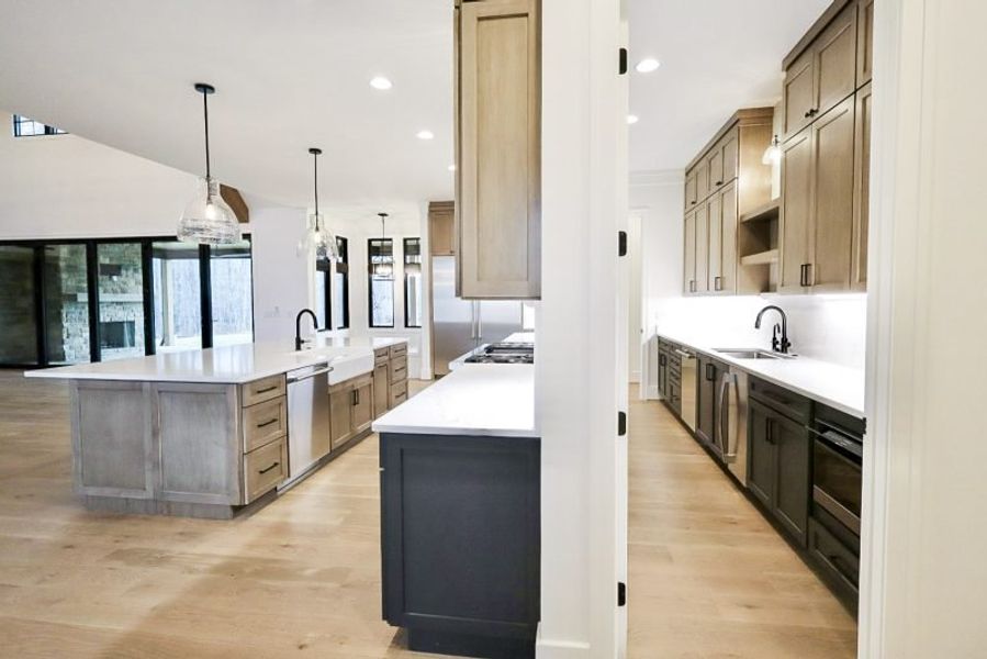 Representative furnished interior of a home built from the Thomastown by Riverstone Construction, LLC in River Gorge Ranch, Guild (Image 6).