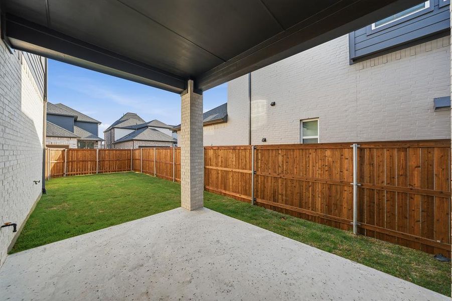 Exterior details and patio area of a home in Light Farms Brenham - 40' Lots, Celina (Image 3). Exterior details and patio area of a home in Light Farms Brenham - 40' Lots, Celina (Image 3).