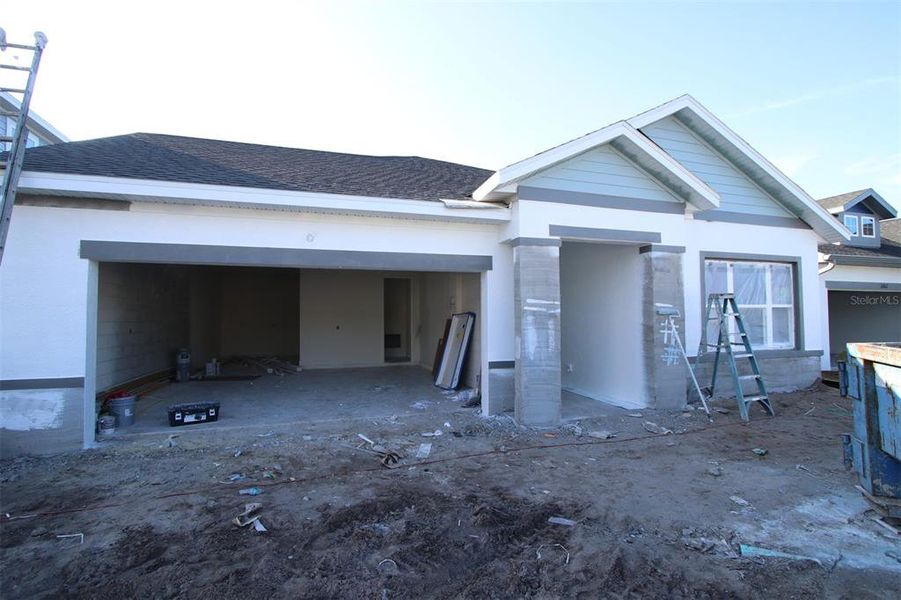 In-progress construction of a new home in Oakfield at Mount Dora Village Series, Mount Dora, FL (Image 4).