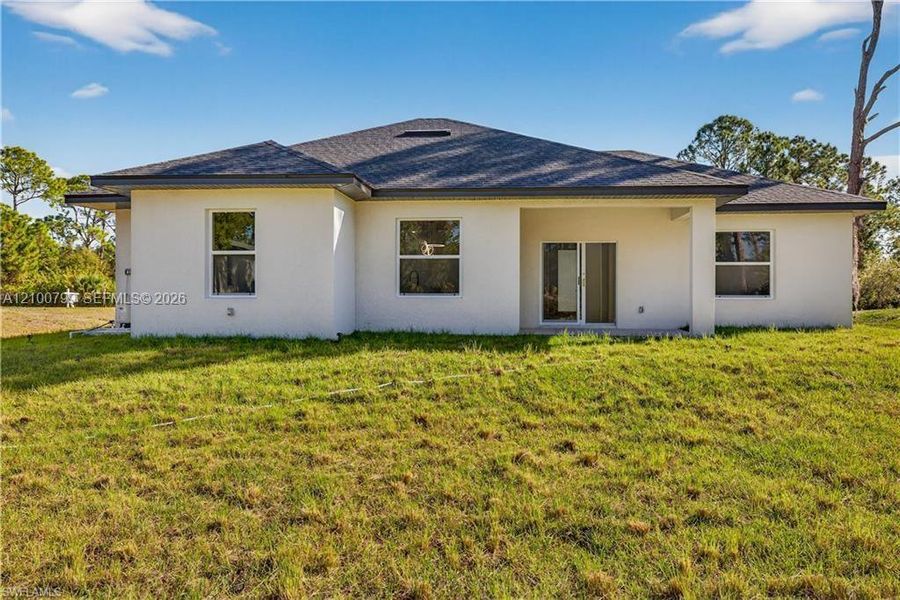 Exterior details and patio area of a home in , Lehigh Acres (Image 21). Exterior details and patio area of a home in , Lehigh Acres (Image 21).