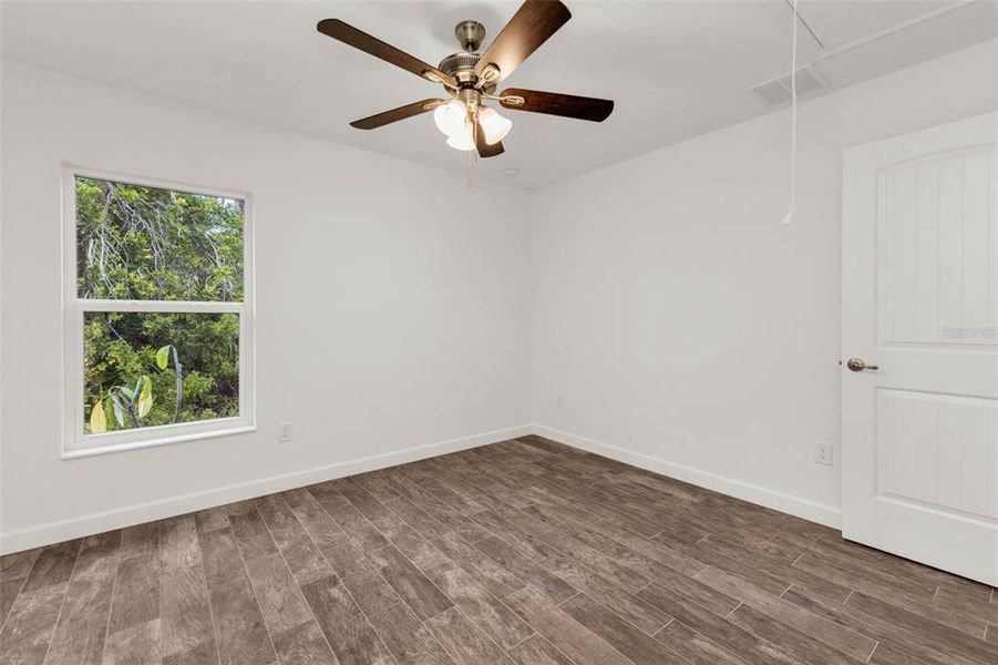 Spacious, unfurnished interior of a new home in , Port Charlotte (Image 28).