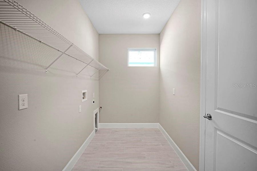 Spacious, unfurnished interior of a new home in Esplanade at Wiregrass Ranch, Wesley Chapel (Image 22).