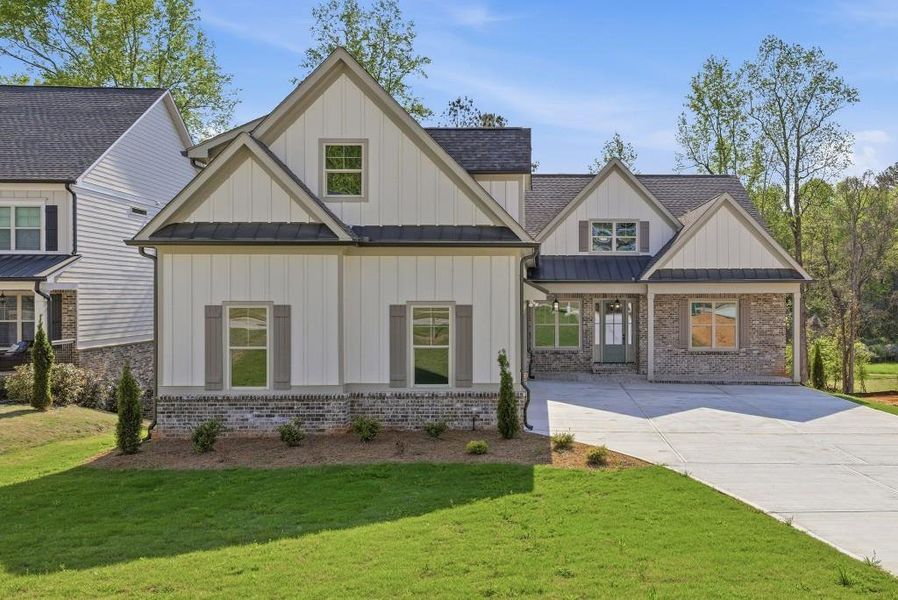 Front exterior of a new home in , Jefferson, GA, highlighting curb appeal (Image 33).