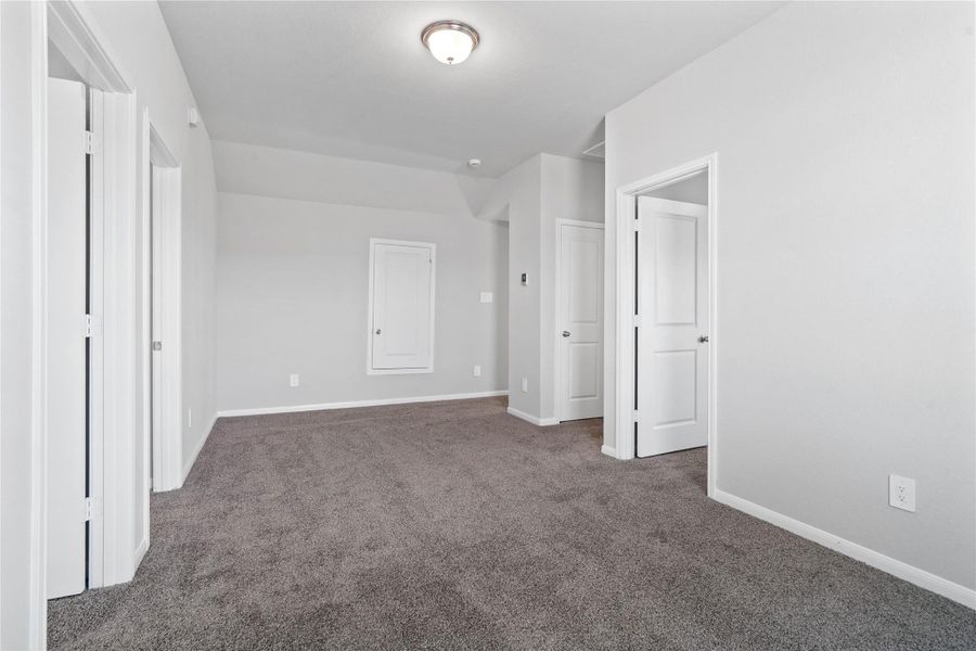 Additional view from Loft looking into entrances to secondary bedooms and bathroom.