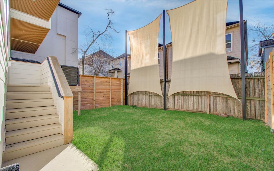 Exterior details and patio area of a home in , Houston (Image 4).