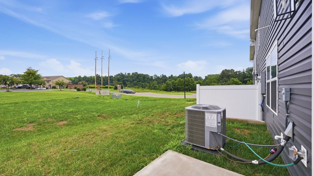 Exterior details and patio area of a home in The Arbor Townhomes, Kingsport (Image 4).