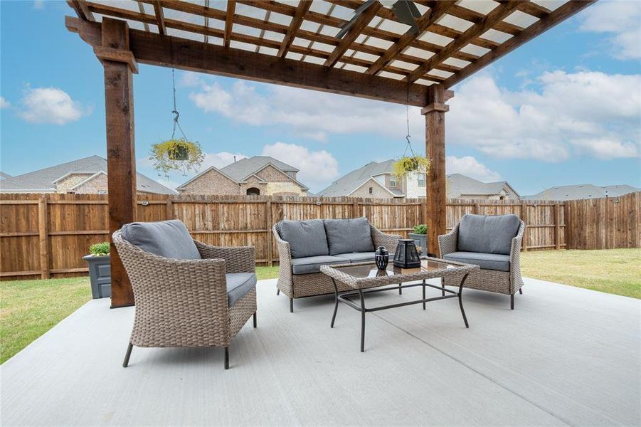 View of patio featuring outdoor lounge area and a pergola