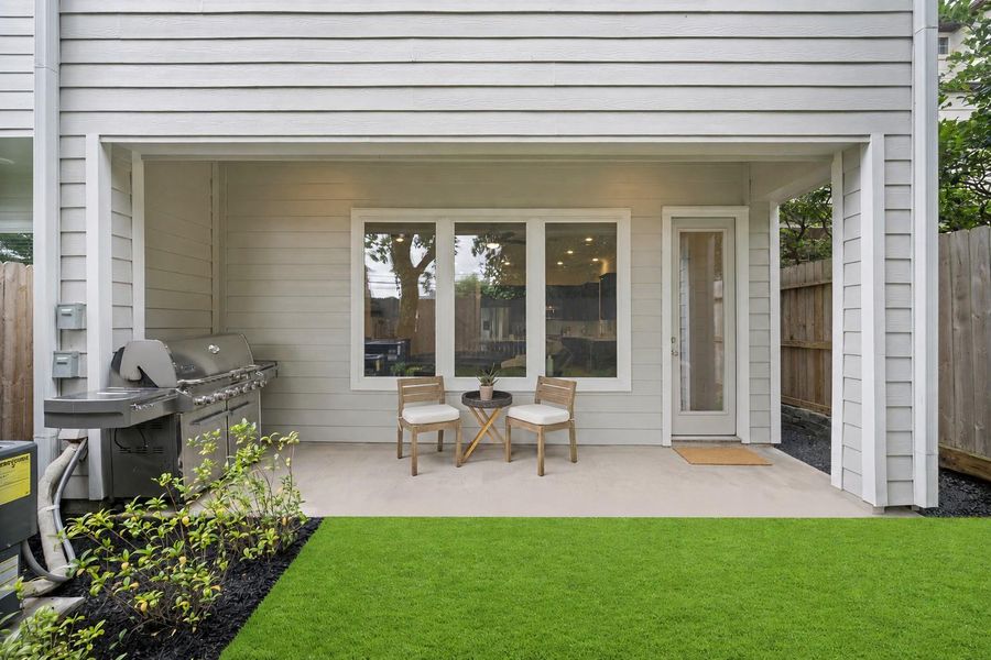 A covered patio with a natural gas hookup for your grill, a fenced yard with real grass — the kind of outdoor space that's genuinely hard to find in this pocket of Montrose. A covered patio with a natural gas hookup for your grill, a fenced yard with real grass — the kind of outdoor space that's genuinely hard to find in this pocket of Montrose.