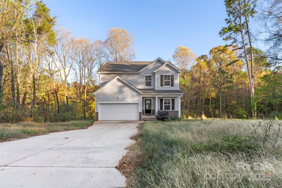 Front exterior of a new home in , Salisbury, NC, highlighting curb appeal (Image 26).