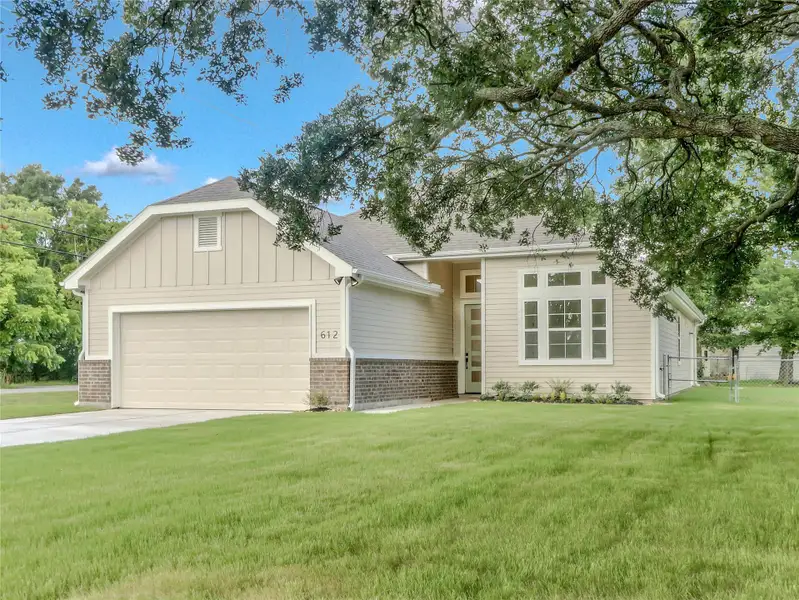 Front exterior of a new home in , Angleton, TX, highlighting curb appeal (Image 2). Front exterior of a new home in , Angleton, TX, highlighting curb appeal (Image 2).