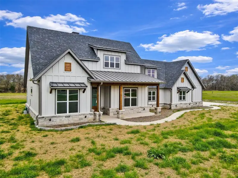 Exterior details and patio area of a home in , Wills Point (Image 3).