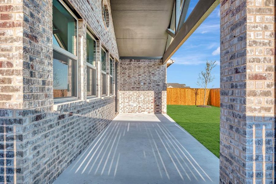 Exterior details and patio area of a home in Timberbrook, Justin (Image 3). Exterior details and patio area of a home in Timberbrook, Justin (Image 3).