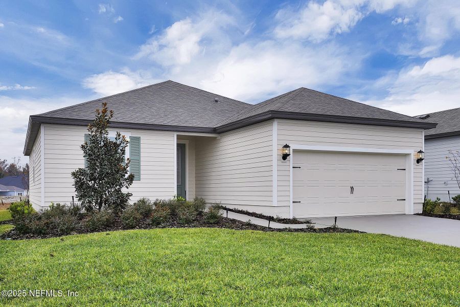 Front exterior of a new home in Jennings Farm, Middleburg, FL, highlighting curb appeal (Image 2).