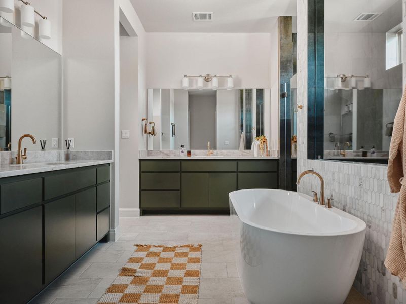 To complete the primary retreat, a spa-inspired ensuite bath offers a perfect relaxing retreat.