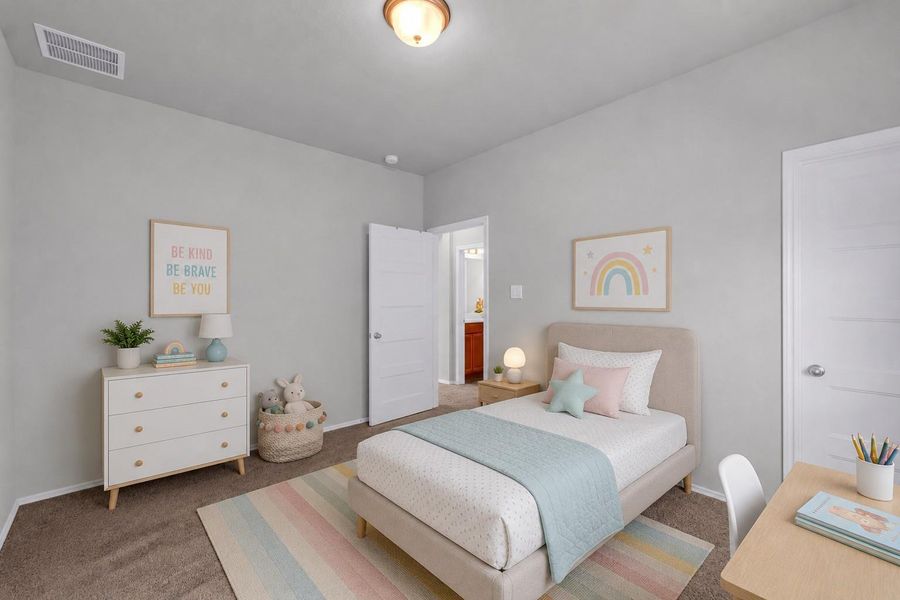 A bright secondary bedroom offers a neutral color palette, a standard closet, and clean lines suitable for a child's room or guest space.**Virtually staged A bright secondary bedroom offers a neutral color palette, a standard closet, and clean lines suitable for a child's room or guest space.**Virtually staged