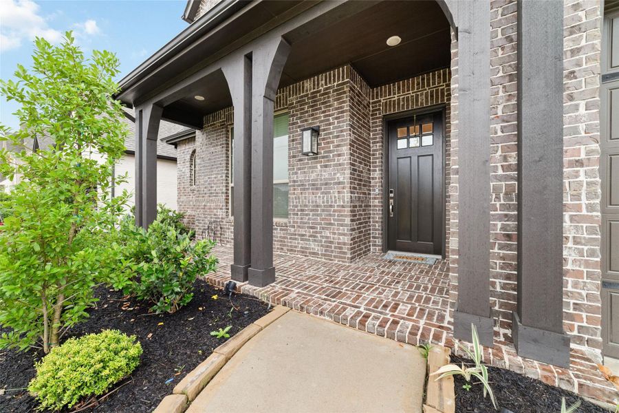 Exterior details and patio area of a home in Elyson, Katy (Image 4).