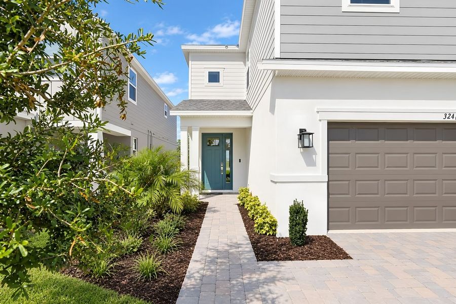 Exterior details and patio area of a home in Lochside, Mount Dora (Image 22).