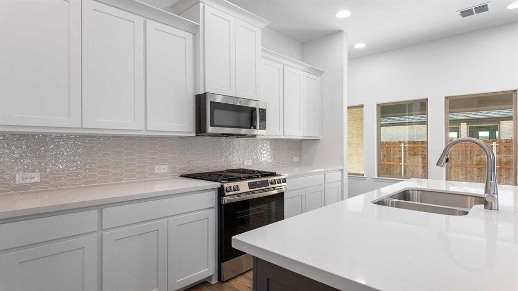 Furnished interior view inside a new home in Avondale 40', Fate (Image 7). Furnished interior view inside a new home in Avondale 40', Fate (Image 7).