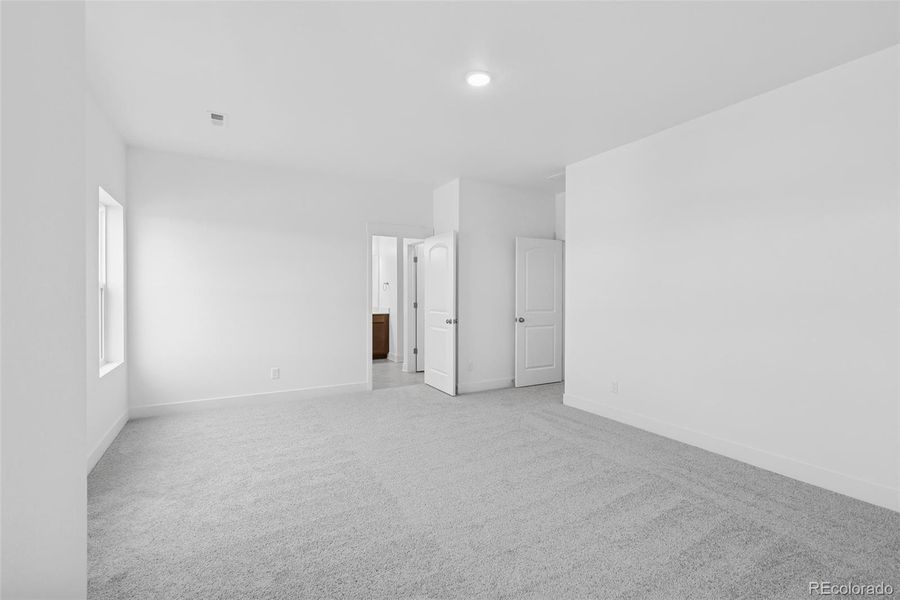 Spacious, unfurnished interior of a new home in Painted Prairie Cottage, Aurora (Image 20).