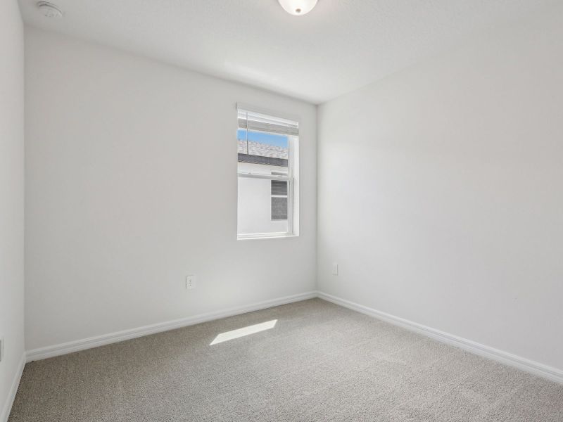 Spacious, unfurnished interior of a new home in Crosswinds - Signature Series, Haines City (Image 10).