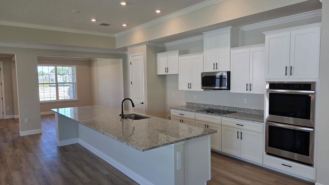 Furnished interior view inside a new home in Island Forest Preserve, Merritt Island (Image 3).