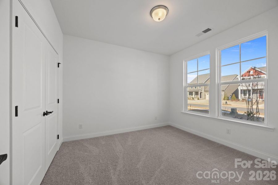 Secondary Bedroom Photos are representative and may not reflect the exact home, finishes, or features.