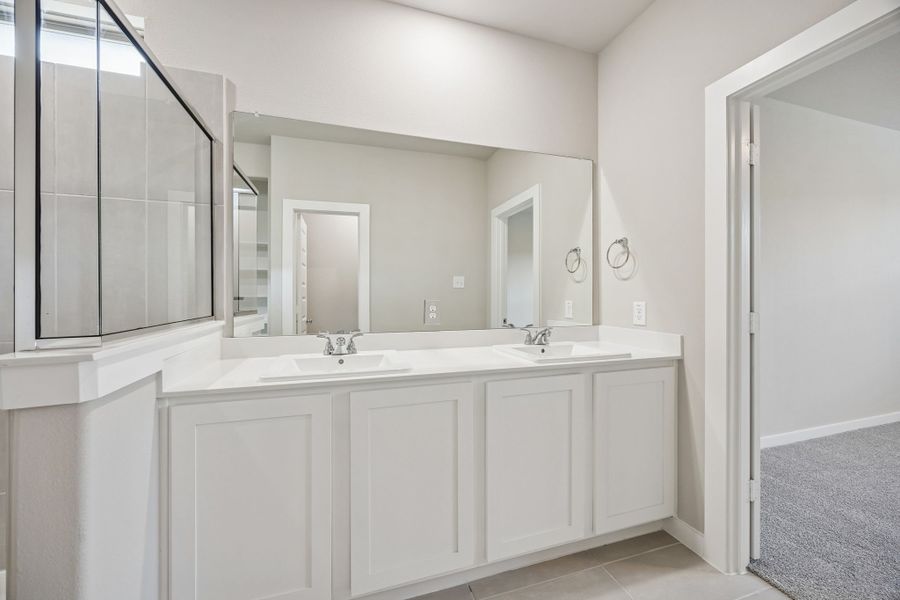 Primary Bathroom in the Willow home plan by Trophy Signature Homes – REPRESENTATIVE PHOTO