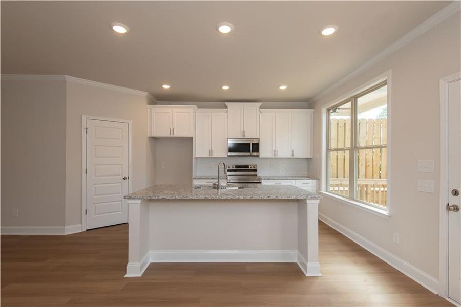 Furnished interior view inside a new home in Towns at Enclave, Lawrenceville (Image 5).