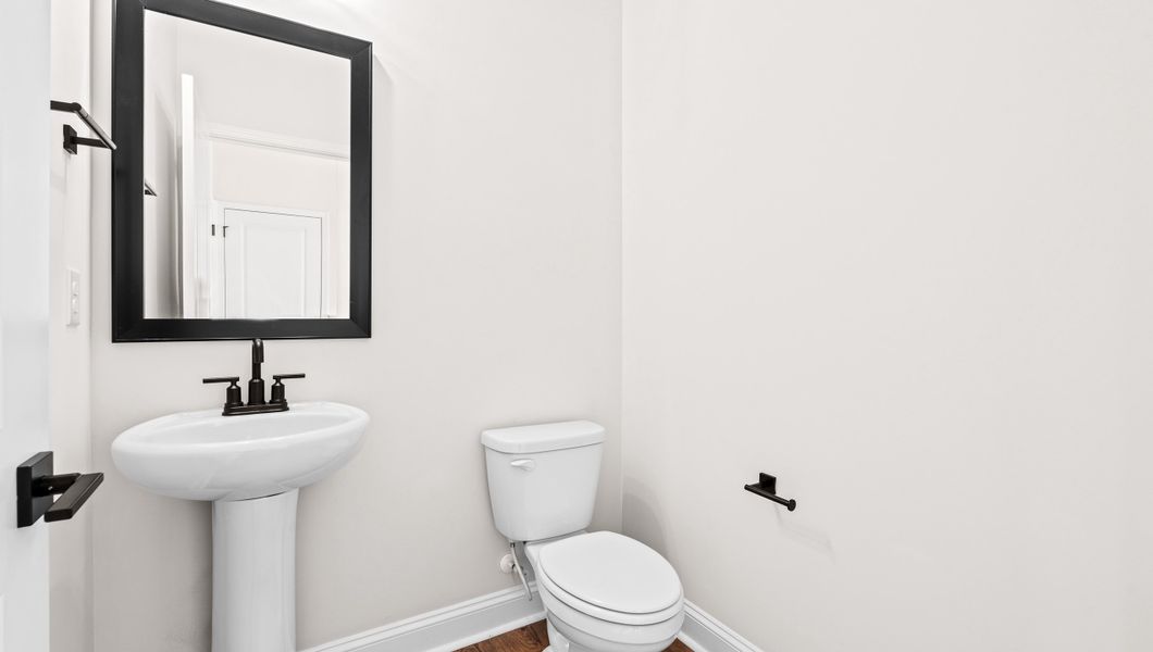 Representative furnished interior of a home built from the VERWOOD by D.R. Horton in Adams Glen, Greenville (Image 10).