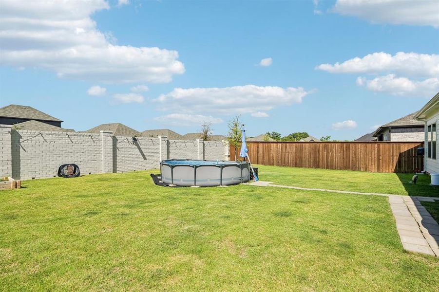 Exterior details and patio area of a home in Lakehaven - Premier Series, Farmersville (Image 24). Exterior details and patio area of a home in Lakehaven - Premier Series, Farmersville (Image 24).
