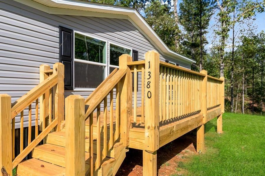 Exterior details and patio area of a home in , Ellijay (Image 23).