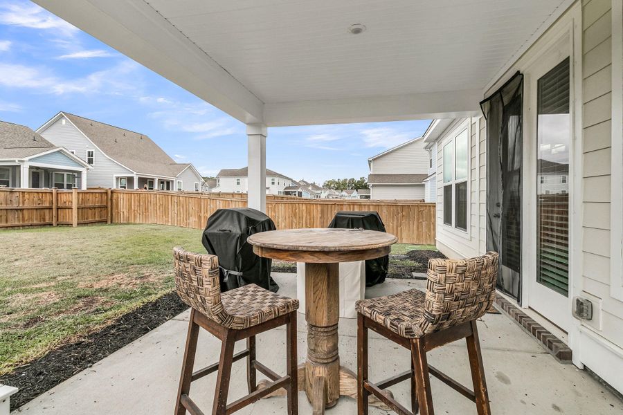 Exterior details and patio area of a home in High Point at Foxbank, Moncks Corner (Image 4).