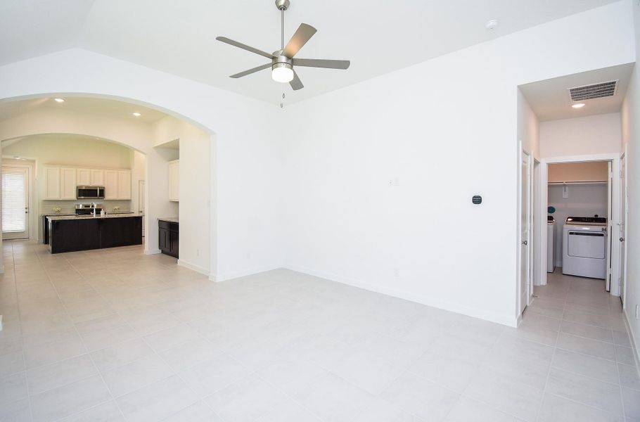 Generous wall and floor dimensions also account for side rooms, and a convenient utility space, right.