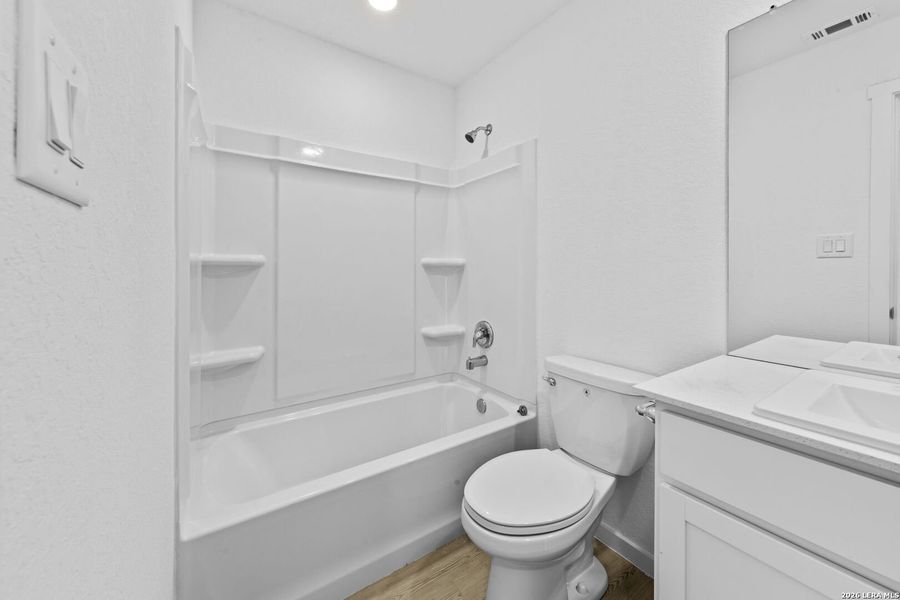 Furnished interior view inside a new home in Spring Grove, St. Hedwig (Image 6).