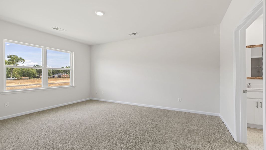Spacious, unfurnished interior of a new home in Durbin Meadows Traditions, Fountain Inn (Image 22).