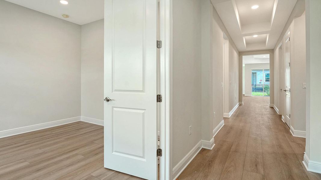 Spacious, unfurnished interior of a new home in Wildleaf Real Estate and Homes for Sale in Parrish, FL - Neal Communities, Parrish (Image 28).