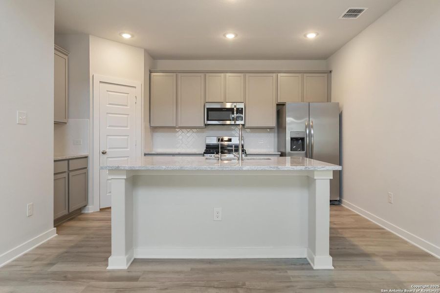 Furnished interior view inside a new home in Timber Creek, San Antonio (Image 7).